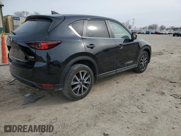 2018 Mazda CX-5 Touring with VIN JM3KFBCM2J0427786, listed as a Copart auction lot 45539345 with 62,989 mi miles and Salvage Title. Bid and sale history available at carsss.com. Image 3.
