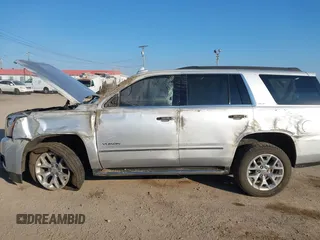 2020 GMC Yukon SLT Standard Edition with VIN 1GKS2DKCXLR294027, listed as a IAAI auction lot 41004965 with 69,161 mi miles. Bid and sale history available at carsss.com. Image 6.