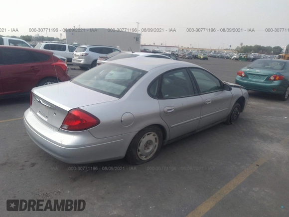 2000 Ford Taurus SES with VIN 1FAFP55U9YA122270, listed as a IAAI auction lot 30771196 with 136,621 mi miles and . Bid and sale history available at DreamBid. Image 4.