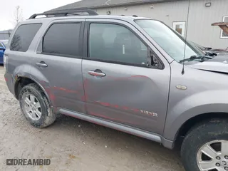 2008 Mercury Mariner with VIN 4M2CU91198KJ18085, listed as a IAAI auction lot 41568365 with 255,661 mi miles. Bid and sale history available at carsss.com. Image 6.