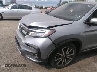 2022 Honda Pilot Touring 7-Passenger with VIN 5FNYF6H60NB013465, listed as a IAAI auction lot 40139627 with 78,161 mi miles. Bid and sale history available at carsss.com. Image 21.
