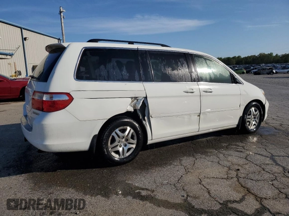 2005 Honda Odyssey EX-L with VIN 5FNRL38785B041017, listed as a Copart auction lot 52191965 with 211,949 mi miles and Salvage Title. Bid and sale history available at carsss.com. Image 3.