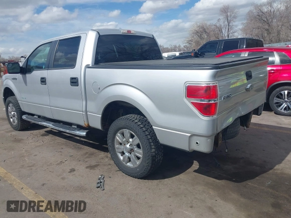 2013 Ford F-150 XL with VIN 1FTFW1ET5DFB70746, listed as a IAAI auction lot 41778848 with 184,879 mi miles. Bid and sale history available at carsss.com. Image 3.