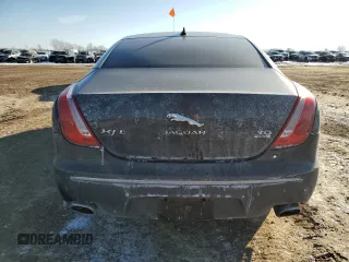2014 Jaguar XJ Portfolio with VIN SAJWJ2GD6E8V73491, listed as a Copart auction lot 42472345 with 68,747 mi miles and Salvage title. Bid and sale history available at DreamBid. Image 6.