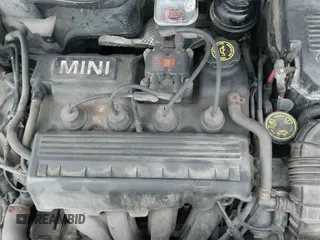 2005 MINI Hardtop with VIN WMWRC33415TC57690, listed as a IAAI auction lot 41653519 with 156,515 mi miles and . Bid and sale history available at DreamBid. Image 12.