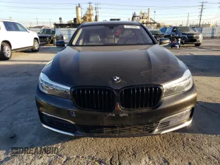 2016 BMW 7 Series 740i with VIN WBA7E2C59GG504533, listed as a Copart auction lot 77122283 with 68,209 mi miles. Bid and sale history available at carsss.com. Image 5.