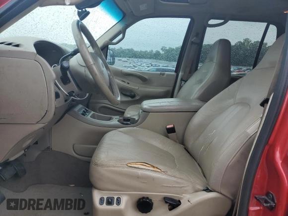 2002 Ford Expedition XLT with VIN 1FMEU17L02LA79716, listed as a Copart auction lot 57635465 with 230,298 mi miles and Salvage title. Bid and sale history available at DreamBid. Image 7.