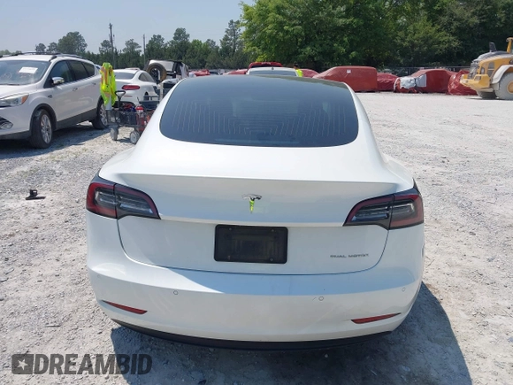 2019 Tesla Model 3 Long Range with VIN 5YJ3E1EB4KF494432, listed as a IAAI auction lot 42009327 with 121,954 mi miles and . Bid and sale history available at DreamBid. Image 16.