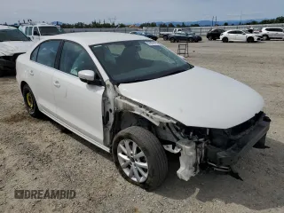 2014 Volkswagen Jetta SE with VIN 3VWD17AJ2EM391314, listed as a Copart auction lot 57357575 with 131,968 mi miles and Salvage title. Bid and sale history available at DreamBid. Image 4.