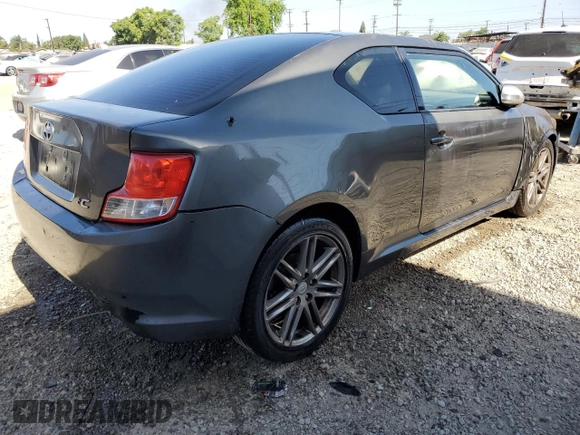 2012 Scion tC z VIN JTKJF5C70C3034928, wystawiony jako Copart lot #61272465 z przebiegiem 183 054 mil mil oraz Szkoda całkowita • Salvage title. Historia ofert i sprzedaży dostępna na DreamBid. Obrazek 3.