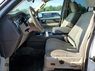 2011 Ford Expedition XLT with VIN 1FMJU1H57BEF45158, listed as a Copart auction lot 62137235 with 223,754 mi miles and Salvage title. Bid and sale history available at DreamBid. Image 7.