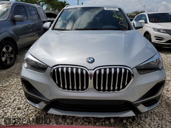 2021 BMW X1 sDrive28i with VIN WBXJG7C04M5S29295, listed as a Copart auction lot 48922203 with 14,214 mi miles. Bid and sale history available at carsss.com. Image 5.