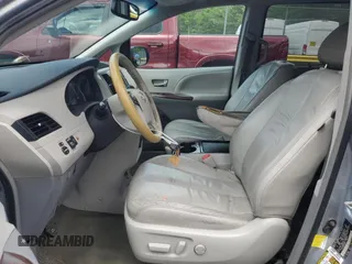 2011 Toyota Sienna XLE AAS z VIN 5TDYK3DC1BS165154, wystawiony jako Copart lot #57044235 z przebiegiem 232 461 mil mil oraz Szkoda całkowita • Salvage title. Historia ofert i sprzedaży dostępna na DreamBid. Obrazek 7.