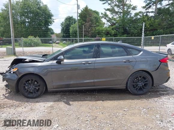 2020 Ford Fusion SE z VIN 3FA6P0HD6LR160147, wystawiony jako IAAI lot #42499983 z przebiegiem 73 971 mil mil oraz . Historia ofert i sprzedaży dostępna na DreamBid. Obrazek 15.