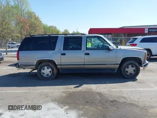 1999 GMC Suburban with VIN 3GKFK16R4XG514928, listed as a IAAI auction lot 41934636 with 245,010 mi miles and . Bid and sale history available at DreamBid. Image 13.
