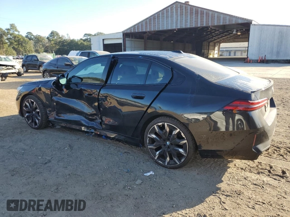2024 BMW 5 Series 530i with VIN WBA43FJ06RCP88933, listed as a Copart auction lot 77122854 with 10,914 mi miles and Salvage Title. Bid and sale history available at carsss.com. Image 2.