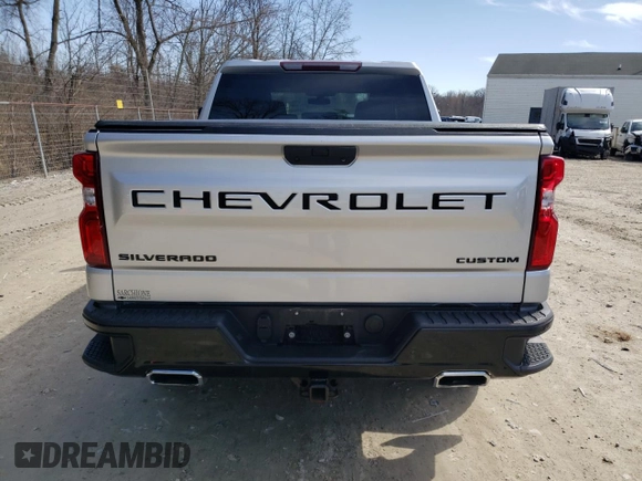 2021 Chevrolet Silverado 1500 Custom Trail Boss with VIN 3GCPYCEF8MG127960, listed as a Copart auction lot 49703345 with 30,157 mi miles and Salvage Title. Bid and sale history available at DreamBid. Image 6.