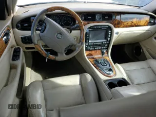 2004 Jaguar XJ with VIN SAJWA73B14TG24590, listed as a Copart auction lot 48438705 with 197,113 mi miles and Clean Title. Bid and sale history available at carsss.com. Image 8.