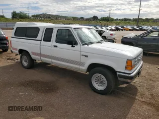 1992 Ford Ranger XLT with VIN 1FTCR15X9NPA98555, listed as a Copart auction lot 57470934 with 104,247 mi miles and Clean Title. Bid and sale history available at DreamBid. Image 4.