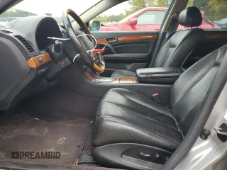 2002 Infiniti Q45 z VIN JNKBF01A52M002920, wystawiony jako Copart lot #73249364 z przebiegiem 95 955 mil mil oraz Tytuł czysty. Historia ofert i sprzedaży dostępna na DreamBid. Obrazek 7.