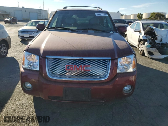 2007 GMC Envoy Denali with VIN 1GKET63MX72135942, listed as a Copart auction lot 77642184 with 166,742 mi miles and Clean Title. Bid and sale history available at DreamBid. Image 5.