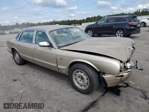 1999 Jaguar XJ z VIN SAJKX6048XC849376, wystawiony jako Copart lot #70538064 z przebiegiem 122 891 mil mil oraz Szkoda całkowita • Salvage title. Historia ofert i sprzedaży dostępna na DreamBid. Obrazek 4.