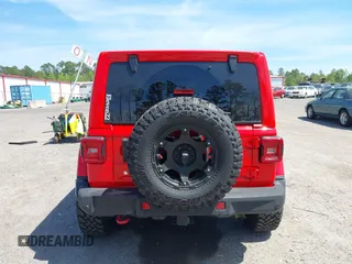 2020 Jeep Wrangler Unlimited Rubicon with VIN 1C4HJXFG9LW106607, listed as a IAAI auction lot 41908295 with 71,083 mi miles and . Bid and sale history available at DreamBid. Image 16.