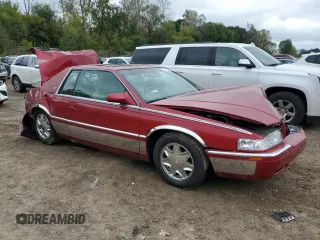 2002 Cadillac Eldorado z VIN 1G6EL12Y82B102243, wystawiony jako Copart lot #72717014 z przebiegiem 165 442 mil mil oraz Czysty tytuł • Clean title. Historia ofert i sprzedaży dostępna na DreamBid. Obrazek 4.