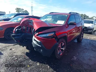 2014 Jeep Cherokee Trailhawk with VIN 1C4PJMBS0EW257133, listed as a IAAI auction lot 41446095 with 82,285 mi miles and . Bid and sale history available at DreamBid. Image 17.
