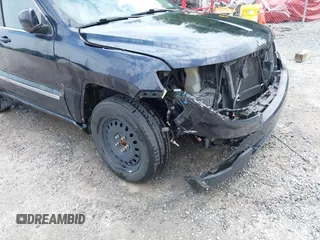 2011 Jeep Grand Cherokee Laredo with VIN 1J4RR4GG8BC543468, listed as a IAAI auction lot 42431481 with 224,639 mi miles and . Bid and sale history available at DreamBid. Image 17.