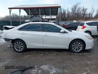 2016 Toyota Camry XSE with VIN 4T1BK1FK2GU570484, listed as a IAAI auction lot 41395359 with 122,852 mi miles. Bid and sale history available at carsss.com. Image 14.