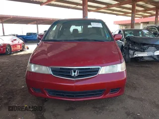 2004 Honda Odyssey EX with VIN 5FNRL186X4B013892, listed as a IAAI auction lot 41731037 with 202,893 mi miles and . Bid and sale history available at DreamBid. Image 12.
