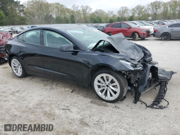 2022 Tesla Model 3 with VIN 5YJ3E1EA1NF369979, listed as a Copart auction lot 51351785 with 0 mi miles and Salvage Title. Bid and sale history available at carsss.com. Image 4.