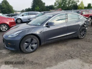 2018 Tesla Model 3 Long Range Battery z VIN 5YJ3E1EB3JF086972, wystawiony jako Copart lot #56290245 z przebiegiem 69 766 mil mil oraz Szkody całkowita. Historia ofert i sprzedaży dostępna na DreamBid. Obrazek 1.