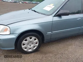 2000 Honda Civic VP z VIN 2HGEJ6612YH575604, wystawiony jako IAAI lot #42395535 z przebiegiem 164 185 mil mil oraz . Historia ofert i sprzedaży dostępna na DreamBid. Obrazek 19.