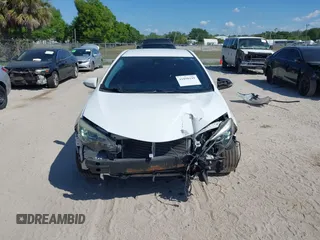 2019 Toyota Corolla L with VIN 5YFBURHE5KP880557, listed as a IAAI auction lot 41898199 with 83,003 mi miles and . Bid and sale history available at DreamBid. Image 12.