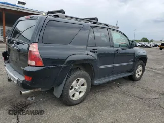 2004 Toyota 4Runner SR5 with VIN JTEBU14R648020185, listed as a Copart auction lot 58983875 with 242,594 mi miles and Clean title. Bid and sale history available at DreamBid. Image 3.
