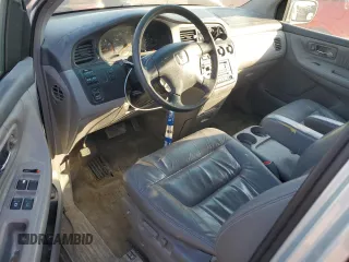 2004 Honda Odyssey EX-L with VIN 5FNRL18994B136383, listed as a Copart auction lot 48235275 with 188,030 mi miles and Salvage Title. Bid and sale history available at DreamBid. Image 8.