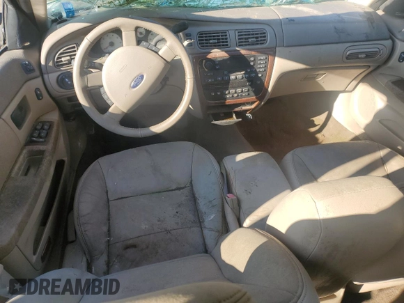2004 Ford Taurus z VIN 1FAFP59SX4A141848, wystawiony jako Copart lot #79389104 z przebiegiem Nie podano mil oraz Nie do naprawy. Historia ofert i sprzedaży dostępna na DreamBid. Obrazek 8.