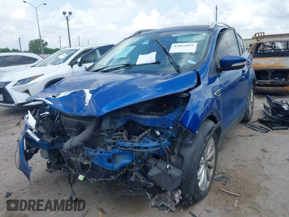 2017 Ford Escape Titanium with VIN 1FMCU0JD3HUE35131, listed as a IAAI auction lot 42062019 with 108,470 mi miles and . Bid and sale history available at DreamBid. Image 18.