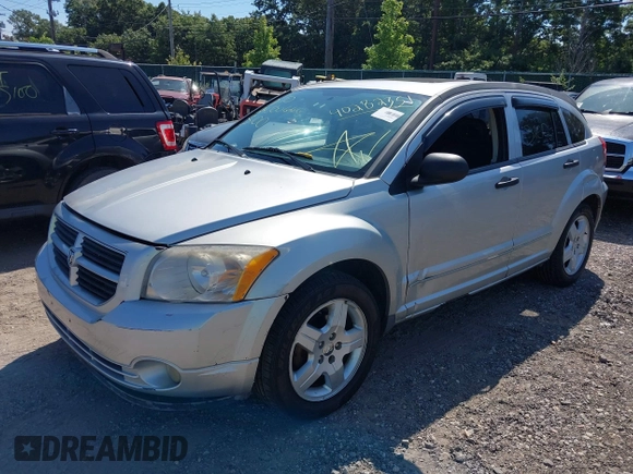 2008 Dodge Caliber SXT with VIN 1B3HB48B48D594124, listed as a IAAI auction lot 40282351 with 142,615 mi miles. Bid and sale history available at carsss.com. Image 2.