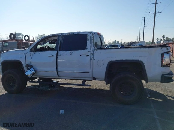 2016 GMC Sierra 1500 SLT with VIN 3GTU2NEC2GG244329, listed as a IAAI auction lot 40810002 with 121,716 mi miles. Bid and sale history available at carsss.com. Image 14.