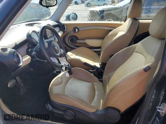 2009 MINI Hardtop S with VIN WMWMF73539TW85698, listed as a Copart auction lot 54957685 with 98,429 mi miles and Clean Title. Bid and sale history available at DreamBid. Image 7.