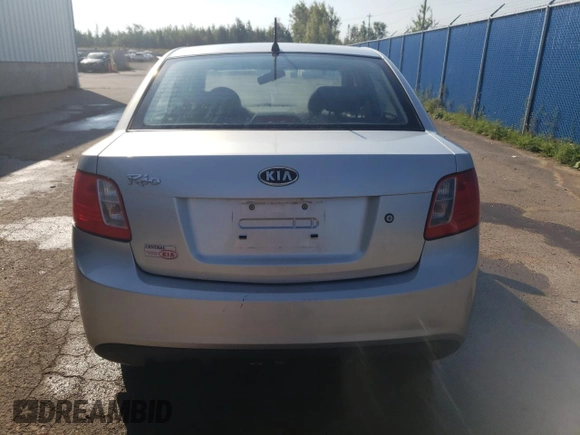 2011 Kia Rio with VIN KNADH4B32B6915275, listed as a Copart auction lot 71546484 with 297,998 mi miles and Salvage Title. Bid and sale history available at DreamBid. Image 6.