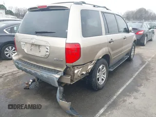 2005 Honda Pilot EX-L with VIN 5FNYF18545B052618, listed as a IAAI auction lot 41798972 with 250,118 mi miles. Bid and sale history available at carsss.com. Image 6.