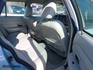 2005 Ford Crown Victoria LX with VIN 2FAFP74W65X135964, listed as a IAAI auction lot 41271175 with 82,494 mi miles. Bid and sale history available at carsss.com. Image 8.