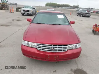 2001 Cadillac Seville z VIN 1G8KS54Y91U227846, wystawiony jako IAAI lot #42134095 z przebiegiem 216 766 mil mil oraz . Historia ofert i sprzedaży dostępna na DreamBid. Obrazek 6.