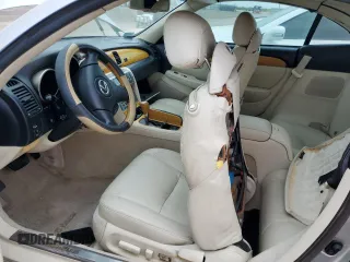 2004 Lexus SC with VIN JTHFN48Y940057153, listed as a Copart auction lot 77005184 with Not Provided miles and Salvage Title. Bid and sale history available at carsss.com. Image 7.