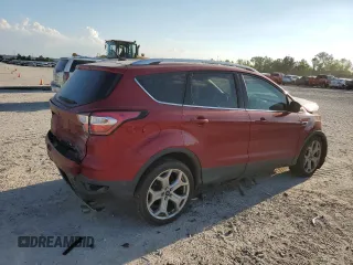 2017 Ford Escape Titanium with VIN 1FMCU0J97HUD52930, listed as a Copart auction lot 71851014 with 101,467 mi miles and Salvage Title. Bid and sale history available at carsss.com. Image 3.