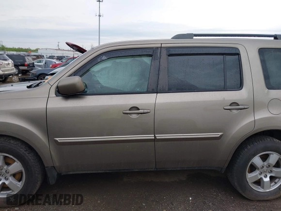 2011 Honda Pilot EX-L with VIN 5FNYF4H51BB076050, listed as a IAAI auction lot 42122883 with 143,288 mi miles and . Bid and sale history available at carsss.com. Image 15.